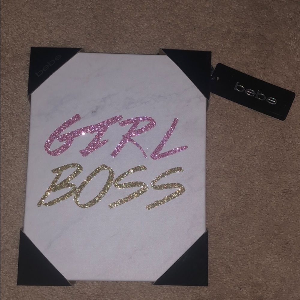 “Girl Boss” wall decor.
